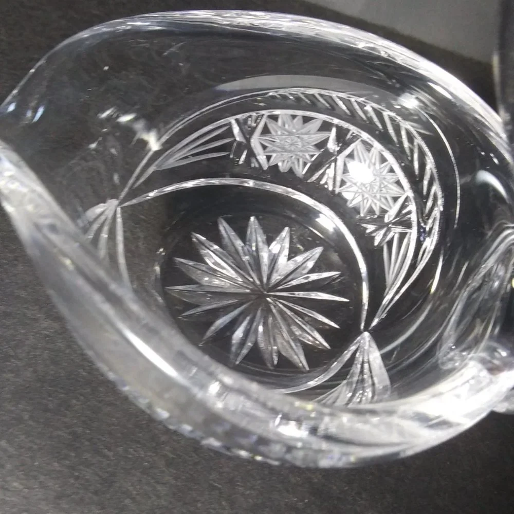 lovely clear glass swan shaped trinket dish with cut design on sides